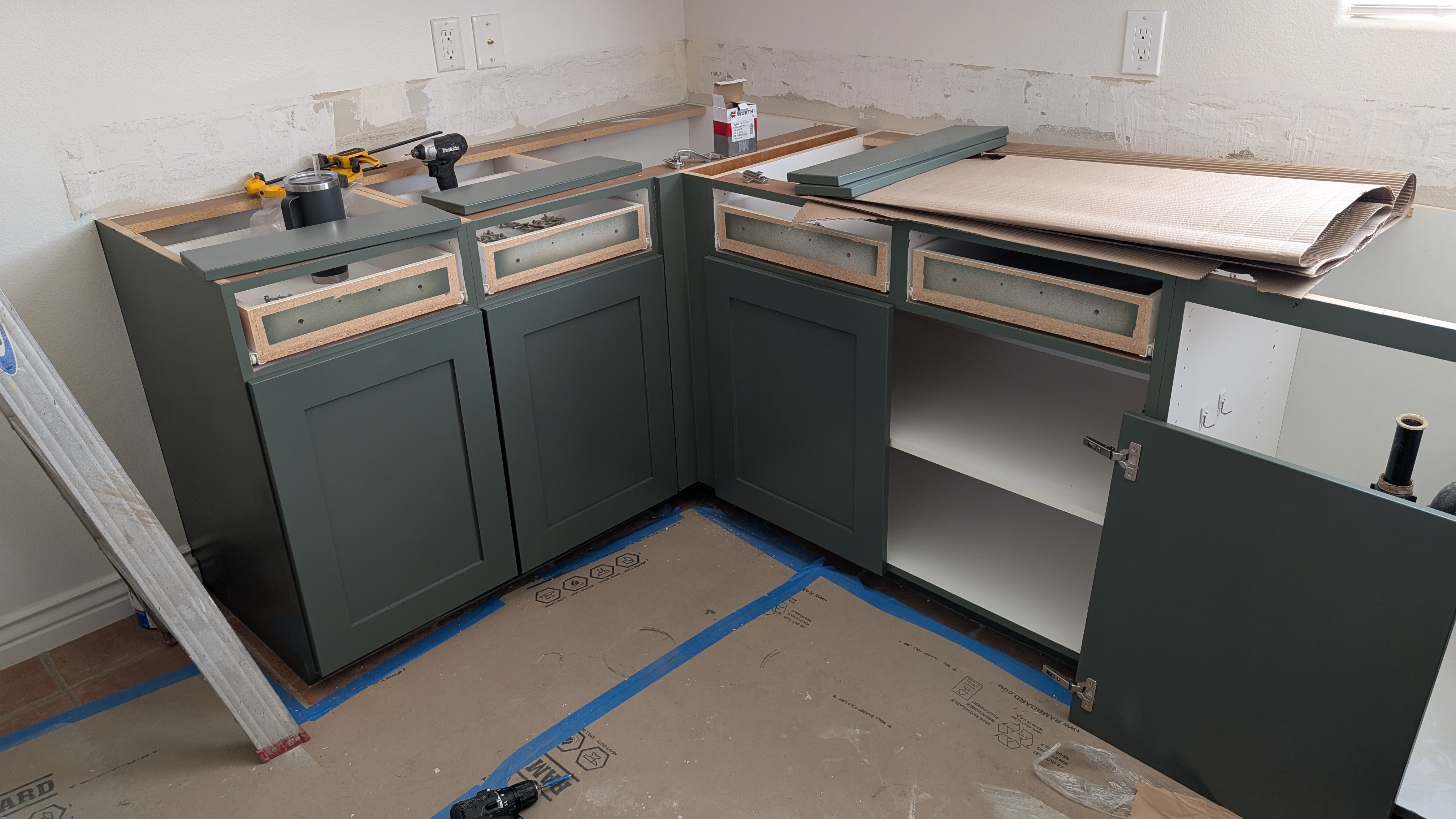New kitchen cabinets being installed on site by Haggerty Construction