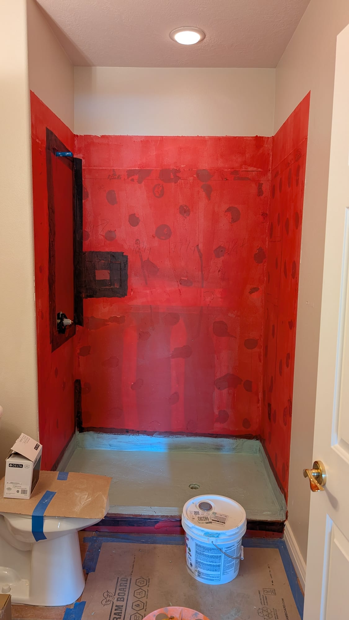 Full shower waterproofing membrane applied before tile — Haggerty Construction