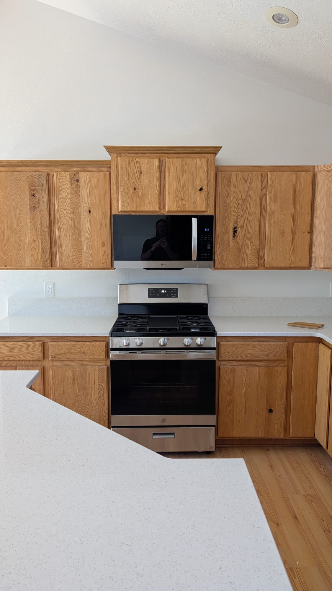 Original oak kitchen before a Haggerty Construction remodel