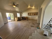 Great room mid-remodel with new flooring going in