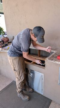 Kitchen cabinetry installation with crown molding