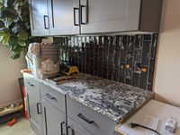 Bathroom floor tile installation in progress