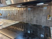 Custom shower niche tile installation with precision cuts